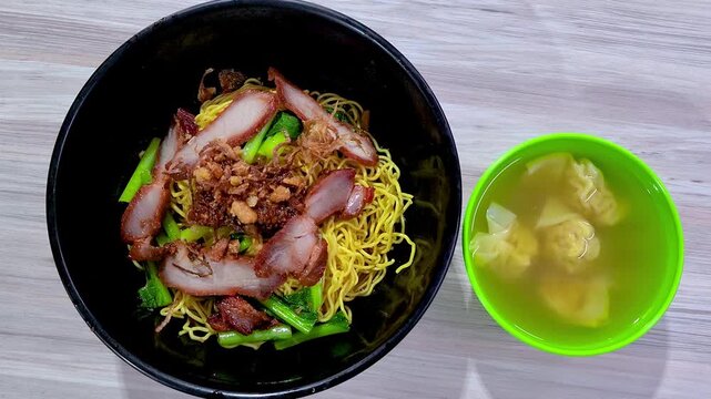 Top view of "Wan Ton" noodle. Traditional chinese food in Singapore and Malaysia.
