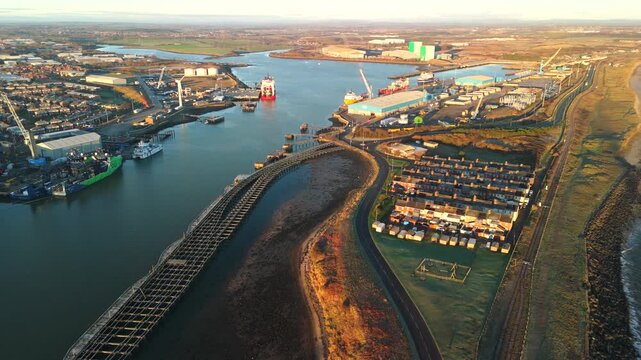 Blyth Northumberland UK: 31st Dec 2025: Drone aerial view of Port of Blyth with docks and industrial buildings along the water in the harbour