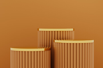 Display of three cylindrical stands in orange and gold colors