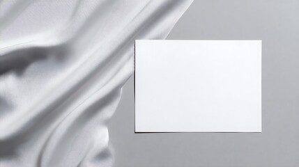 Fototapeta premium Blank Wedding Invitation Card Mockup with White Fabric Background