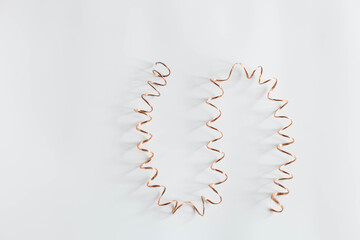 copper, copper spiral on a white background, metal