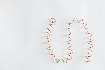 copper, copper spiral on a white background, metal