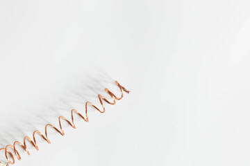 copper, copper spiral on a white background, metal