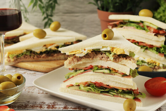 Different Italian tramezzini sandwich in tradition triangle form
