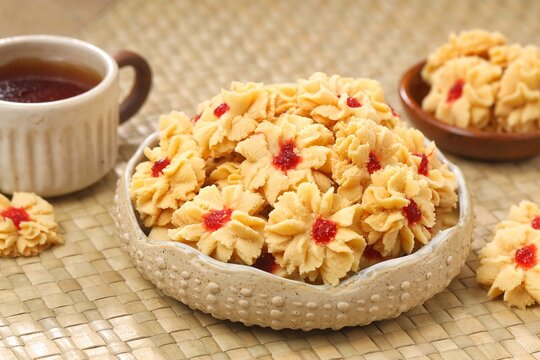 Semprit mawar or biskut semperit dahlia are a traditional cake popular during Eid Al Fitr. These cookies are shaped like roses
