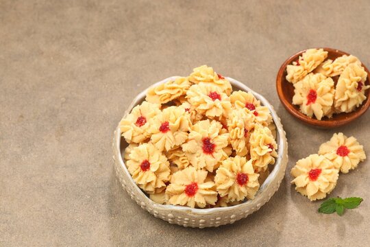 Semprit mawar or biskut semperit dahlia are a traditional cake popular during Eid Al Fitr. These cookies are shaped like roses