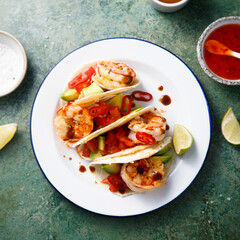 Taco with shrimps and avocado