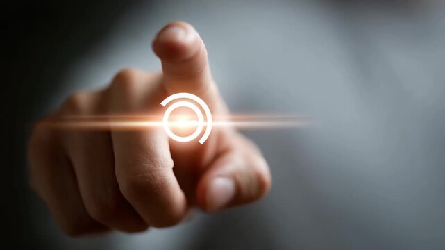 Finger touching illuminated virtual screen interface. Focused on a finger about to touch a glowing circle. A sense of technological innovation and interaction is presented