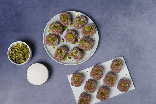 Kandi Pedha is a traditional Indian sweet made using fresh sugarcane juice (kandi), slowly reduced and cooked to achieve a rich, caramelized flavor. Known for its natural sweetness, soft texture, and 