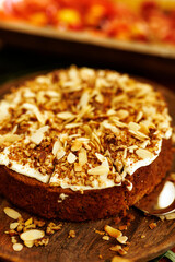 Close-Up of Cake With Almond Topping and Cream Frosting