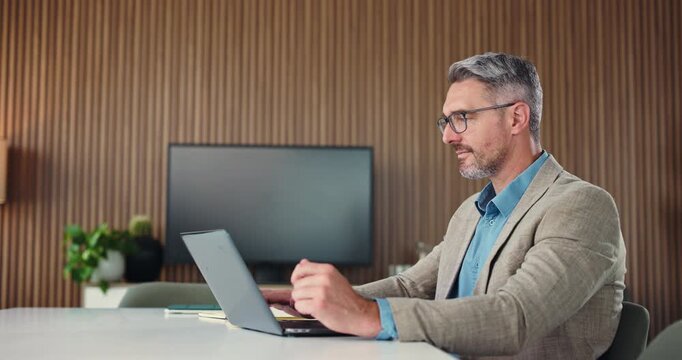 Typing, journalist or man in office with laptop, industry research or edit of article. Reading, source verification or mature person with tech, proofreading or fact check for digital publication.