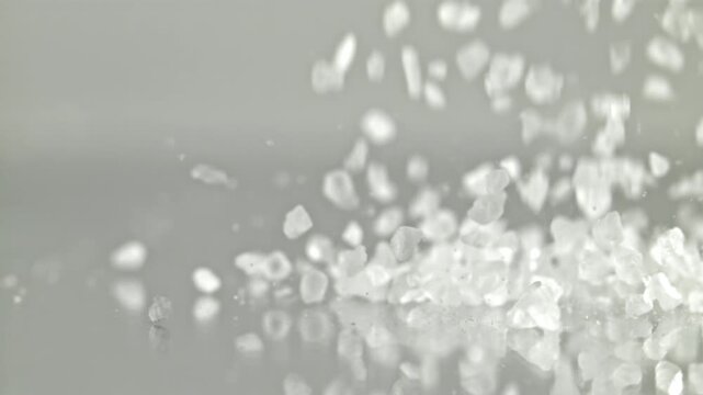 Super slow motion falling sea salt . Filmed on a high-speed camera at 1000 fps. High quality FullHD footage
