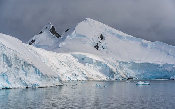 Glacier in Antarctica Wilhelmina Bay Beautiful Frozen Landscape. Snow on Mountain Range. Stunning Natural Environment Climate Change Melting Ice Capsa