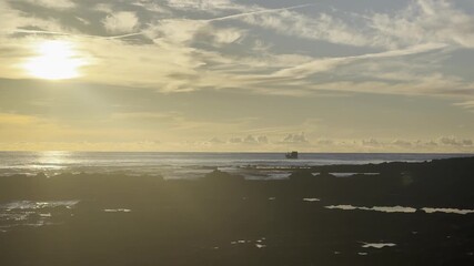 View of the sea and rocks of the beach of Olhos de Agua, Albufeira, Algarve, Portugal.