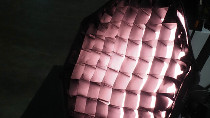  a lighting modifier or softbox.