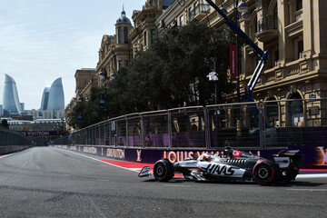 Naklejka premium BAKU, AZERBAIJAN - SEPTEMBER 19, 2025: British driver Oliver Bearman competes in the MoneyGram Haas F1 Team car during the Formula 1 Azerbaijan Grand Prix