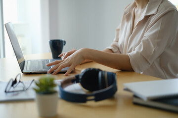 Video conference, Online meeting video call, close up of business woman looking at laptop computer screen working or watching webinar on laptop in home office. work from home concept.