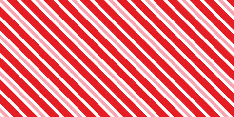 Candy cane Christmas background, peppermint diagonal stripes print seamless pattern © HARTA