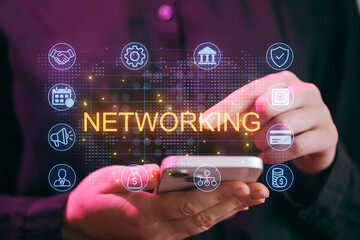 Networking with smartphone at a business event in a bright environment during the daytime