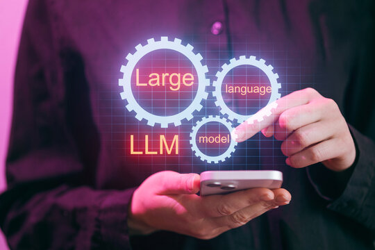 Person holds smartphone while interacting with large language model concepts on screen display - Powered by Adobe