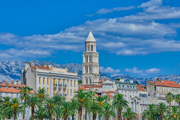 Old town of Split at the waterfront promenade with the bell tower of St Domnius cathedral and small...