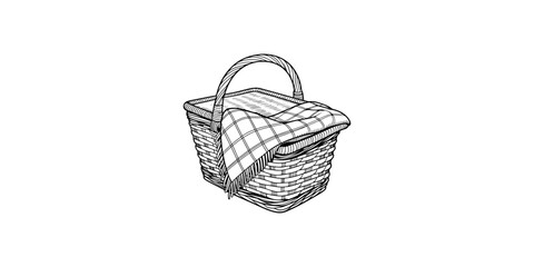Obraz premium Wicker picnic basket with checkered cloth, perfect for outdoor lunches and food transport