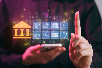 Banking app interface on smartphone with a hand gesturing while using digital icons representing finance and security