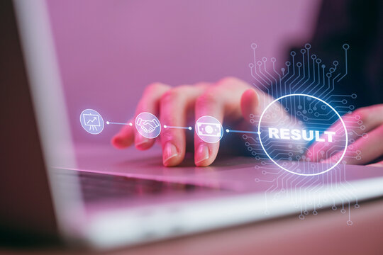 User interacting with computer showing digital results and icons in a workspace - Powered by Adobe
