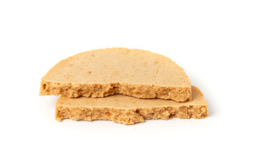 Protein cookie isolated, broken round energy snack with peanuts, chicory fibre