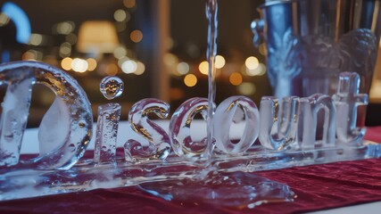 Pouring Liquid Onto Discount Ice Sculpture at Evening Event