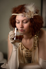 1920s woman drinking whisky
