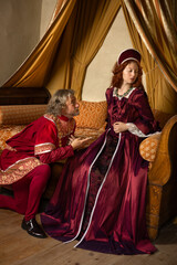 Medieval Renaissance couple in bedroom