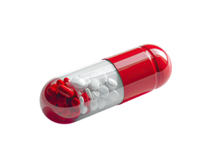 Close-up of a transparent capsule filled with small red and white pills