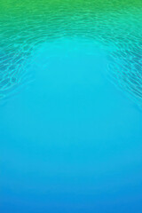 Tranquil blue water surface with gentle ripples and gradient hues