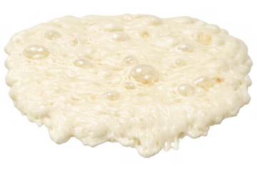 Sourdough starter dough fermenting with active rising bubbles showing wild yeast growth on transparent background