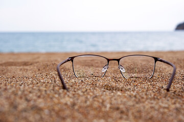 glasses on the beach