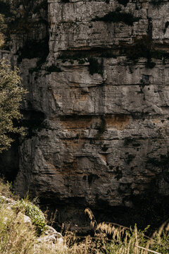 Gole Della Stretta Canyon Near Syracuse In Sicily: Dramatic Limestone Cliffs, Deep Rock Formations, And Mediterranean Vegetation In Rugged Natural Landscape