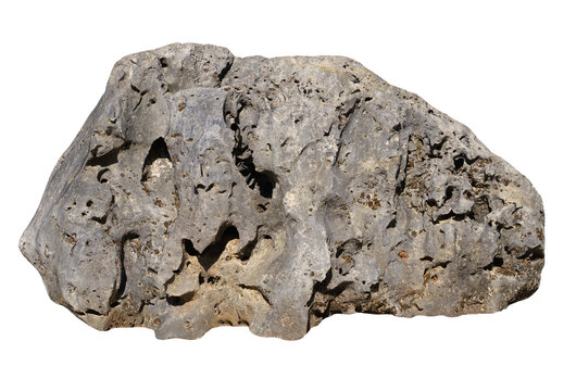 Porous grey rock isolated. Rough stone boulder with holes.