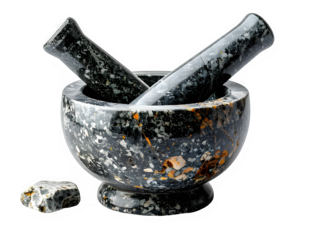 Ancient stone mortar and pestle for grinding spices.