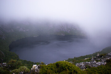 Australia, the dramatic Crater Lake in Tasmania was created when glacial snow and ice gouged out a crater-like hollow, that's now filled with water. This stunning lake is definitely worth visiting!