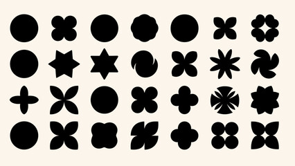 Fototapeta premium Collection of abstract geometric shapes in black on a cream background.