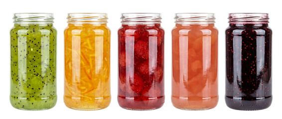 Five glass jars filled with jams and marmalade made from kiwi, orange, strawberries, quince, and blackberries