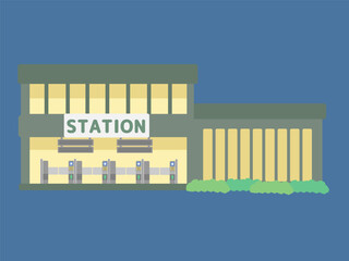 深緑の外観に灯りが映える夜の駅舎イラスト