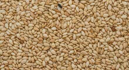 Fototapeta premium Detailed Top View of Natural Sesame Seeds Texture for Healthy Eating Concepts and Food Industry Background