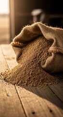 Animal feed granules in burlap sack on wooden table. Organic livestock fodder and poultry nutrition in rustic style