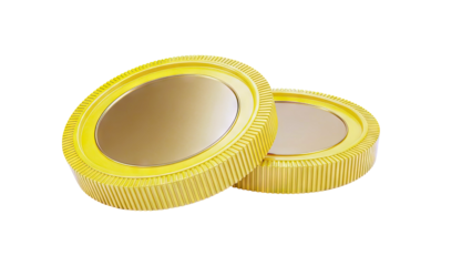 Two gold coins with ribbed edges on a white background