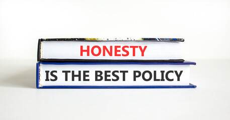 Honesty is the best policy symbol. Concept words Honesty is the best policy on beautiful books. Beautiful white paper background. Business honesty is the best policy concept. Copy space.