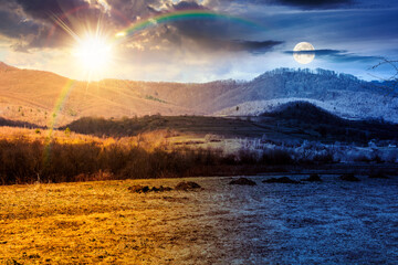 day and night time change concept. beautiful view of countryside scenery with field in march with sun and moon at twilight. equality and shift template