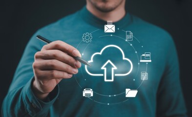 Businessman using stylus to interact with cloud computing interface for data upload and download. Concept for cloud technology, data storage, remote access, digital transformation, and networking.
