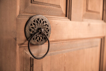 old historical wooden door and metal knocker